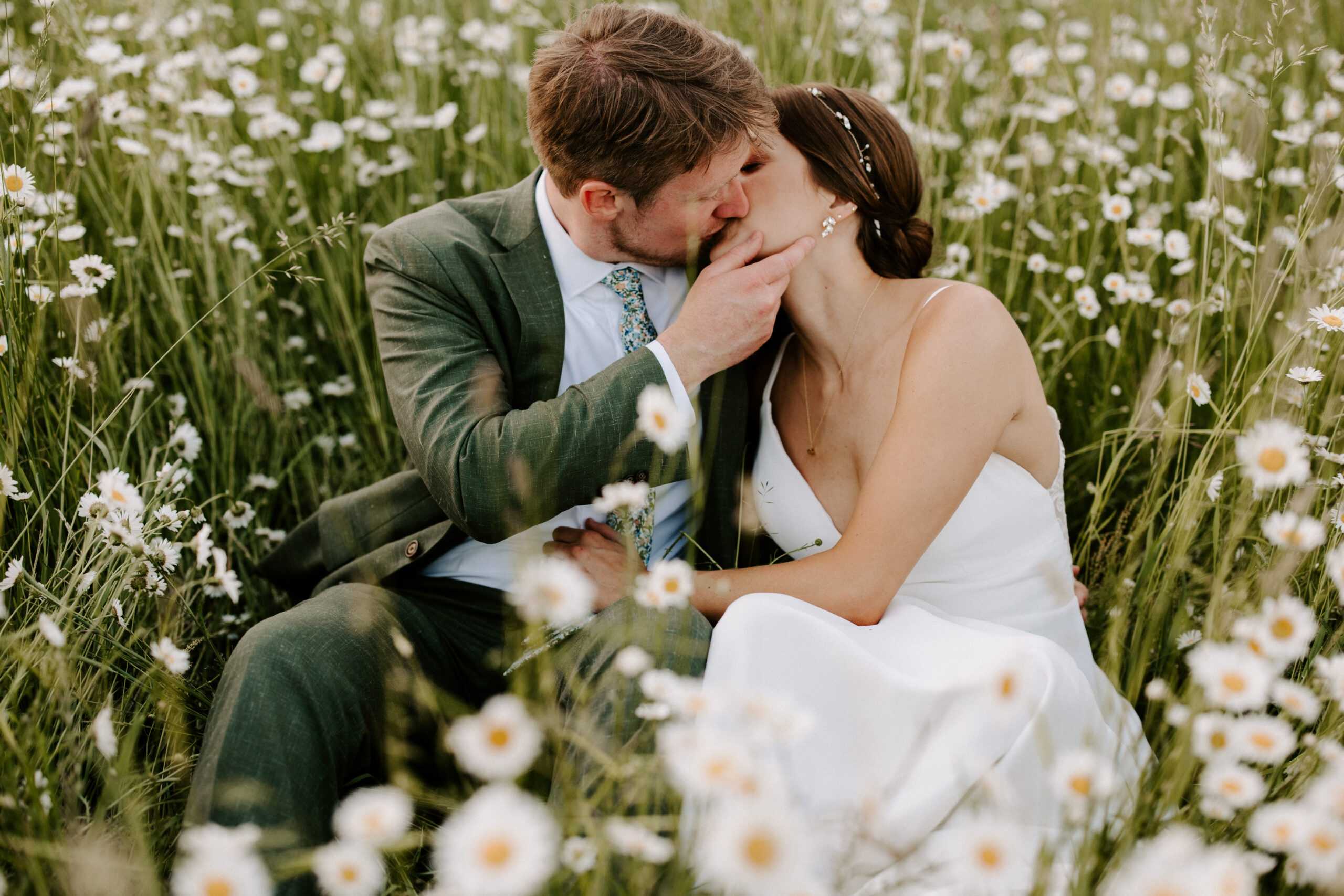 bride + groom in flowers